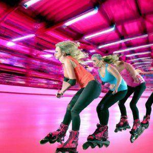 young girls speed skating at a skating rink
